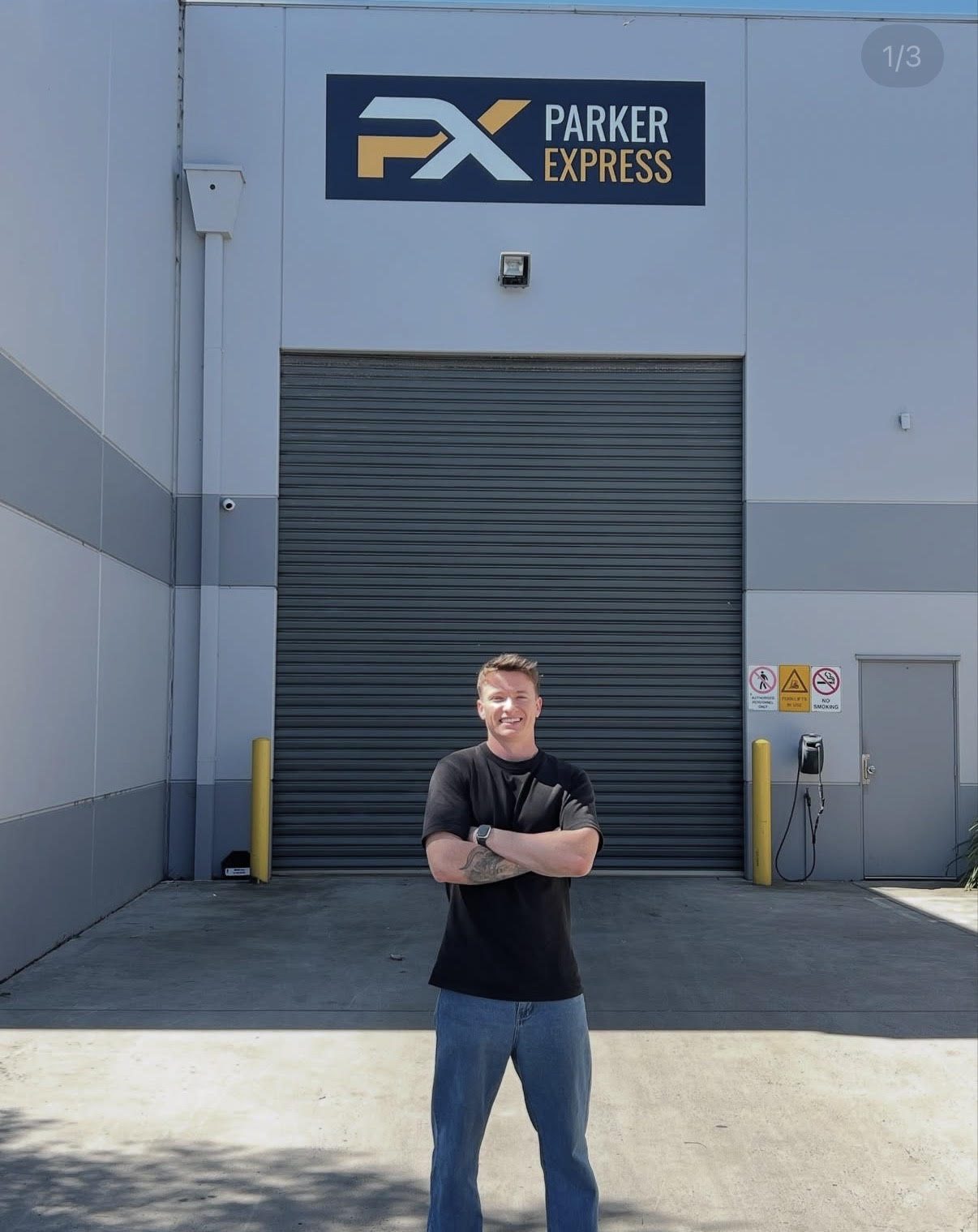 Billy Parker, Founder of Parker Express, standing in front of the Parker Express warehouse in Melbourne